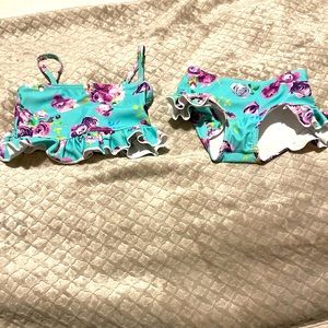 Little girls 2 piece swimsuit. Blue with purple flowers.